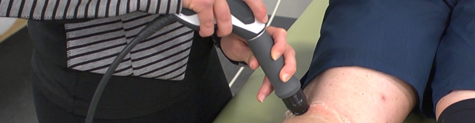 EPAT shockwave therapy applied to a patient's knee