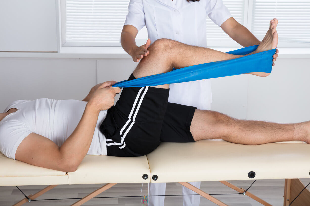 ACL rehabilitation exercise guided by a physical therapist