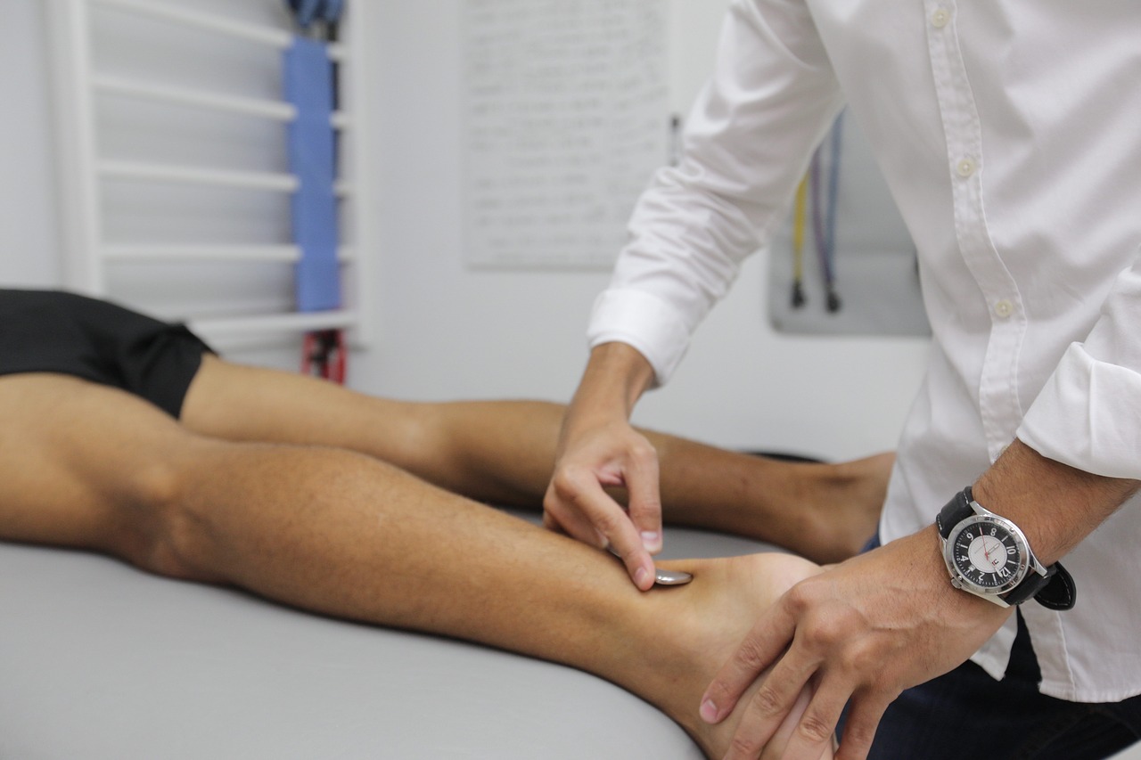 Physical therapist treating chronic heel pain